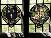Armorial stained glass, circa 1665, on the Jacobean staircase