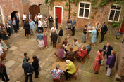 A drinks reception in the courtyard